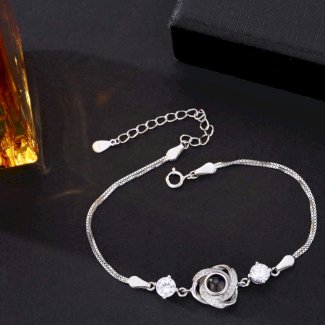 Foto Projektion Armband mit Bild im Stein - Rotierende Dreiblättrige Blume